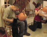 Kari, Bill, Brit, and of course, China (the cat) carving.